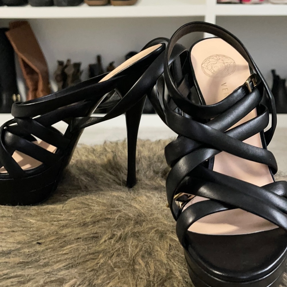 Worn for one hour, like new, Versace sandal.